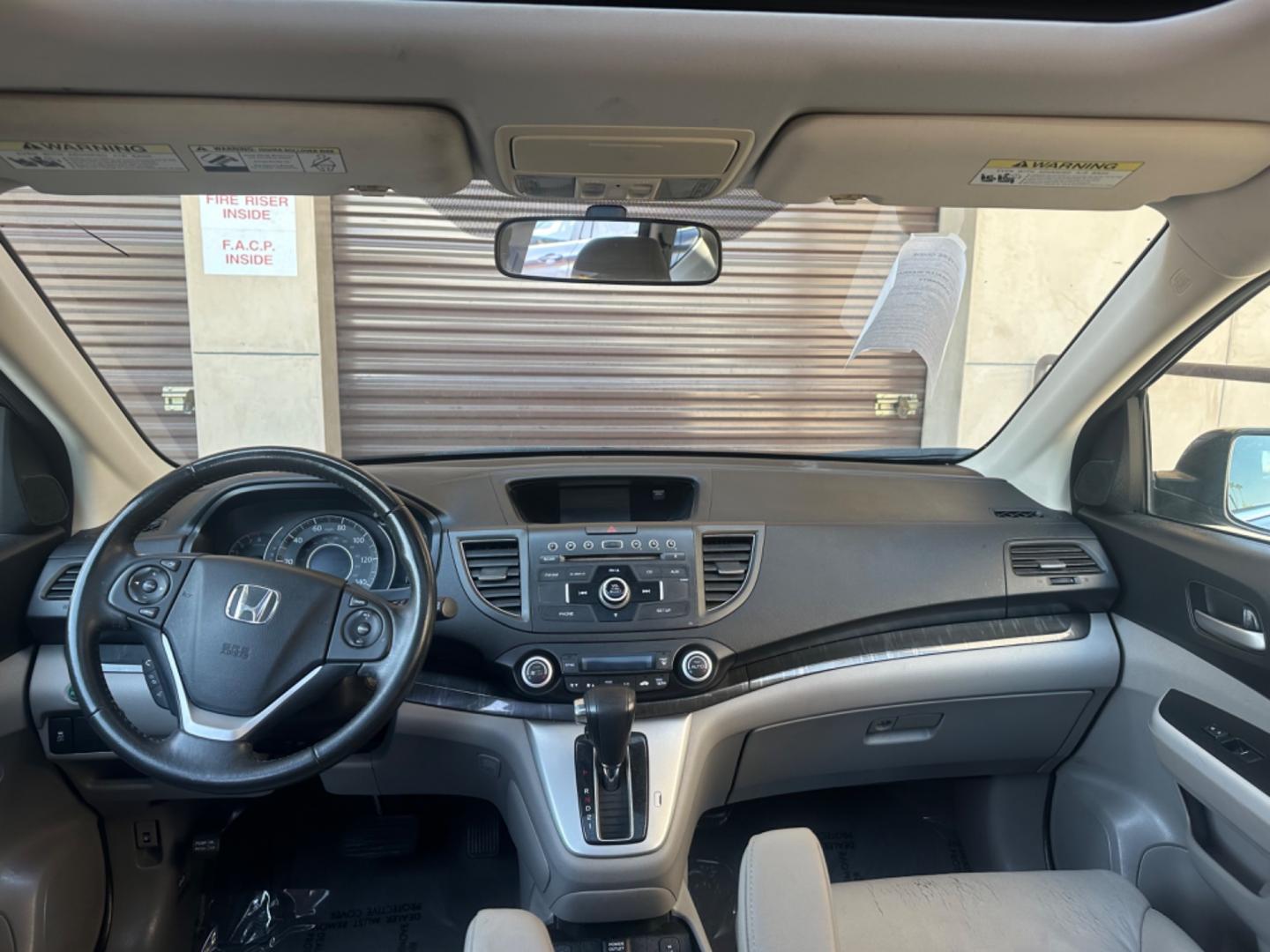 2012 BLUE /GRAY Honda CR-V leather (JHLRM3H70CC) with an 4 CYLINDER engine, Automatic transmission, located at 30 S. Berkeley Avenue, Pasadena, CA, 91107, (626) 248-7567, 34.145447, -118.109398 - Cars and Trucks!! Leather! Moon-roof! Well equipped! In the bustling streets of Pasadena, CA, and the vibrant neighborhoods of Altadena, Glendale, and the broader LA County, finding a reliable, stylish, and affordable vehicle can be a daunting task, especially if you're navigating the complexities - Photo#15